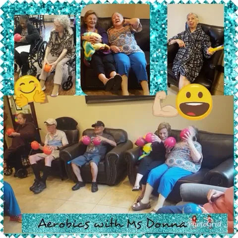 Residents taking part in a seated morning aerobics session at Seasons